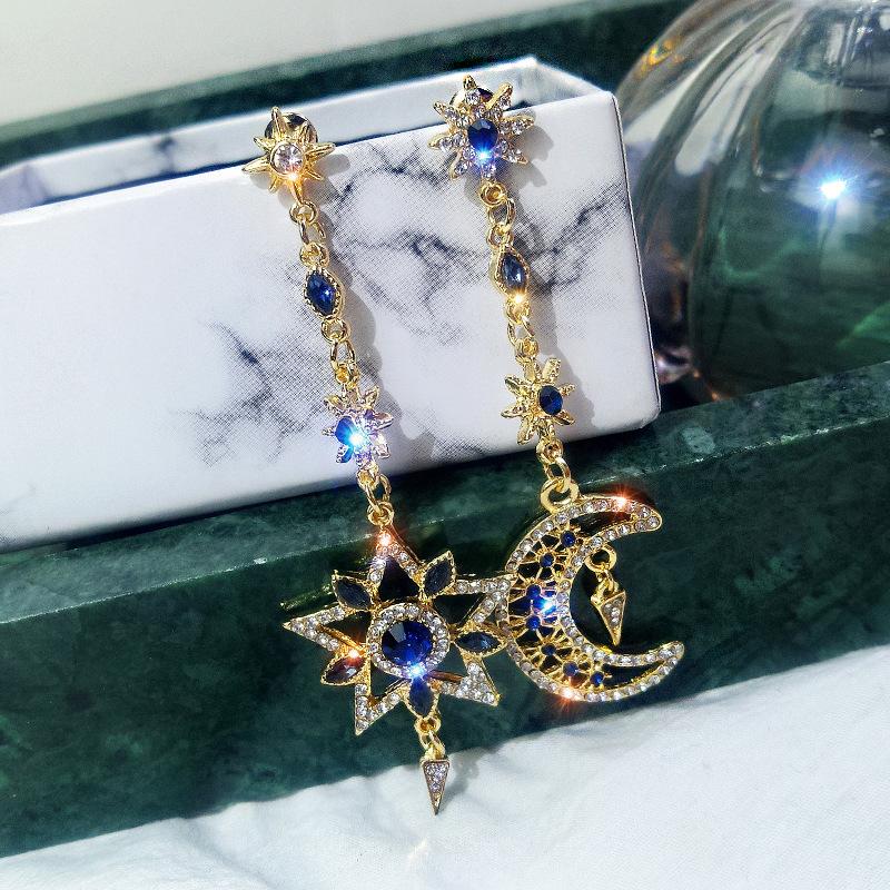 

Temperament Luxury Shining High Quality 5A Zircon Hollowed-out Star Moon Asymmetrical Long Dangle Earrings for Women Jewelry