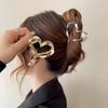 Korean Style High-End Metal Heart Claw Hair Clip for Women - Versatile Hair Accessory for Buns.