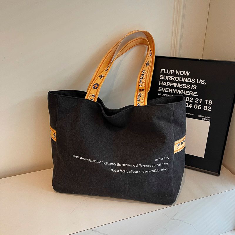 

South Korea Minimalist Canvas Tote Bag Female 2025 New Fashion Casual Commuter Bag Large Capacity Shoulder Bag for Class Black