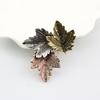 Women Brooch Retro Festival Elegant Geometric Electroplating Christmas Decoration Gifts Three-color Maple Leaf Collar Lapel Pin Fashion Jewelry New