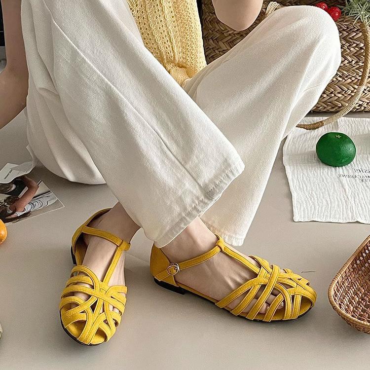 French summer new hollowed-out one-word strap Roman shoes flat-bottomed bag head sandals women's Mori women's niche design hollow