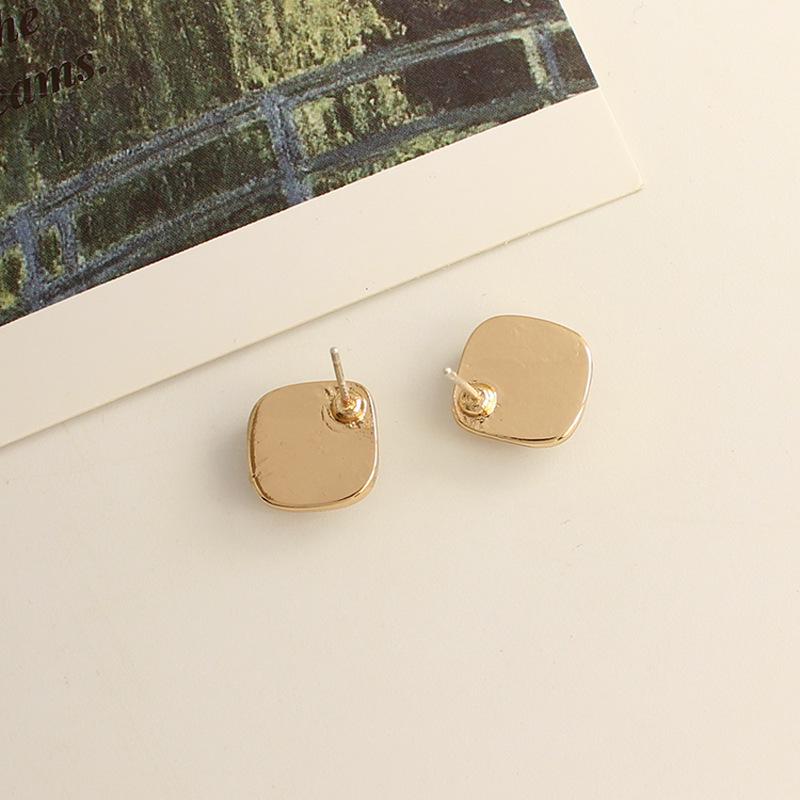 Elegant Chinese Cat's Eye Stone Ear Clips for Women - High-End Mosquito Coil Disc Earrings