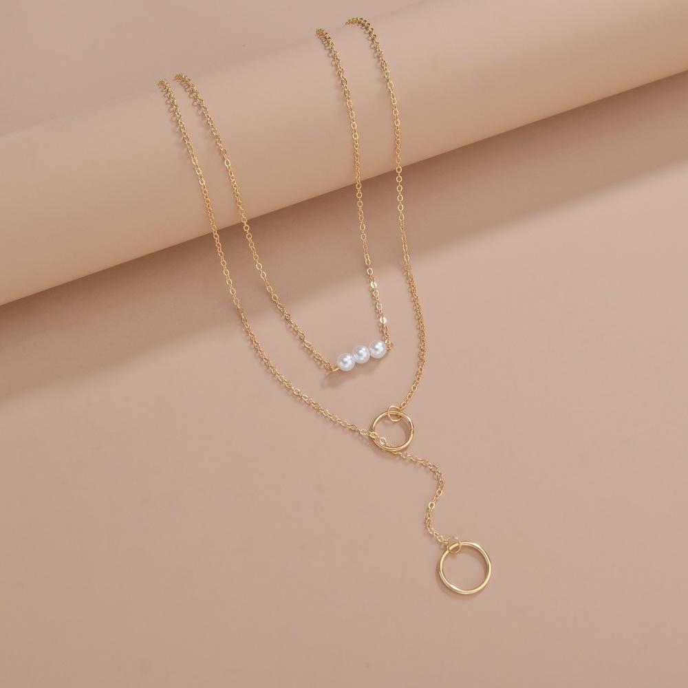 Fashion exaggeration, geometric ring circle pearl pendant, multi-layer stacking design women's long necklace necklace necklace