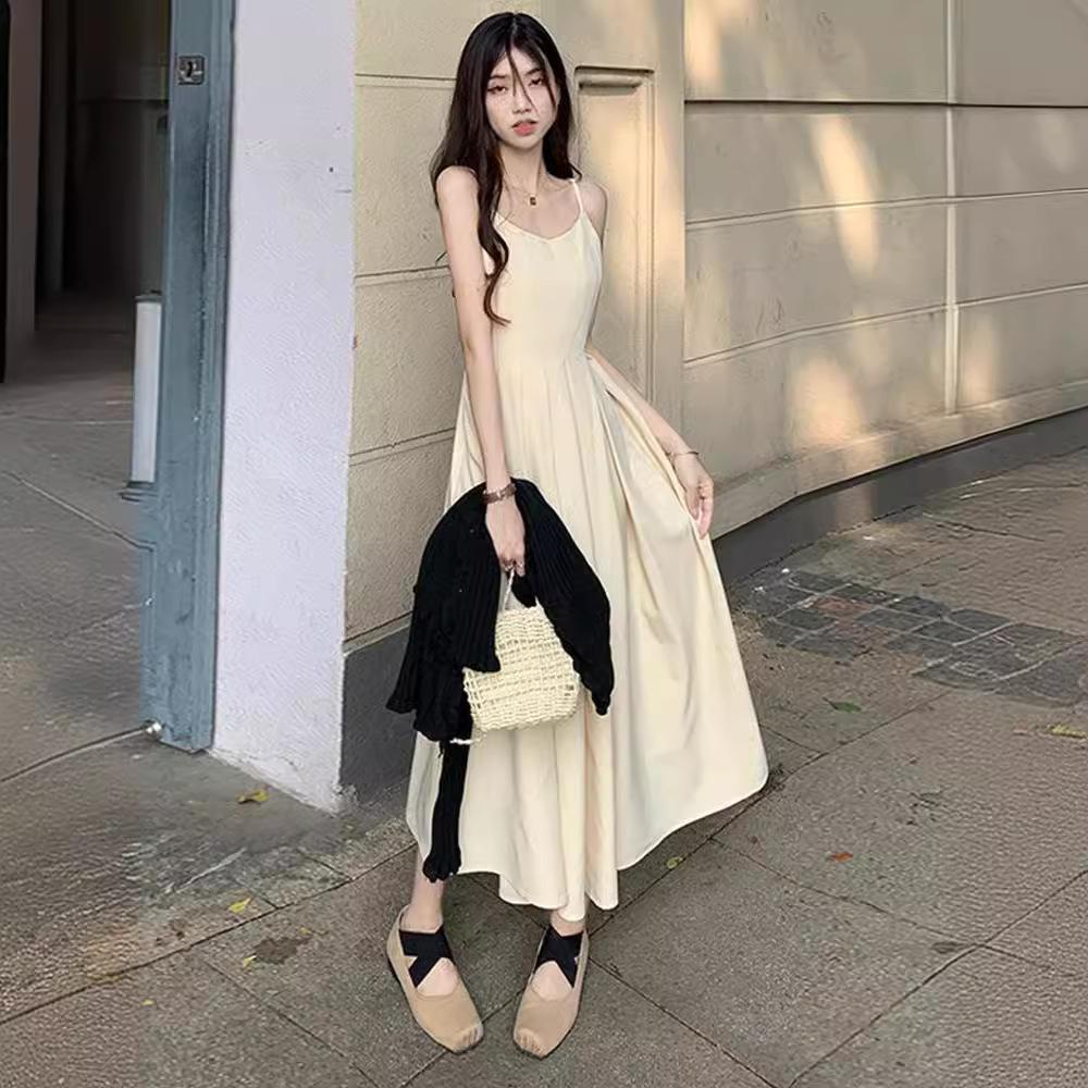 Hepburn style suspender dress summer 2026 new French celebrity temperament waist thin medium and long pleated skirt