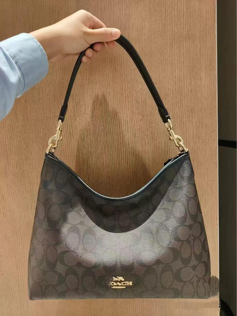 Coach Laurel Hobo Bag: Versatile, Large-Capacity Shoulder, Crossbody, and Handbag for Women.