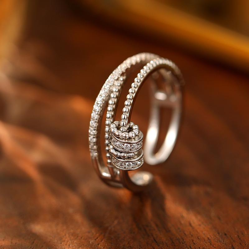 

Женское кольцо-антитревожность Banyan Tree из серебра 925 пробы с вращающимися бусинами и цирконом. Adjustable opening белого золота