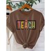 “TEACH them to be kind” Colorful and cute teacher print T Shirt Elegant vintage women's clothing, a gift for the back-to-school season Beautiful