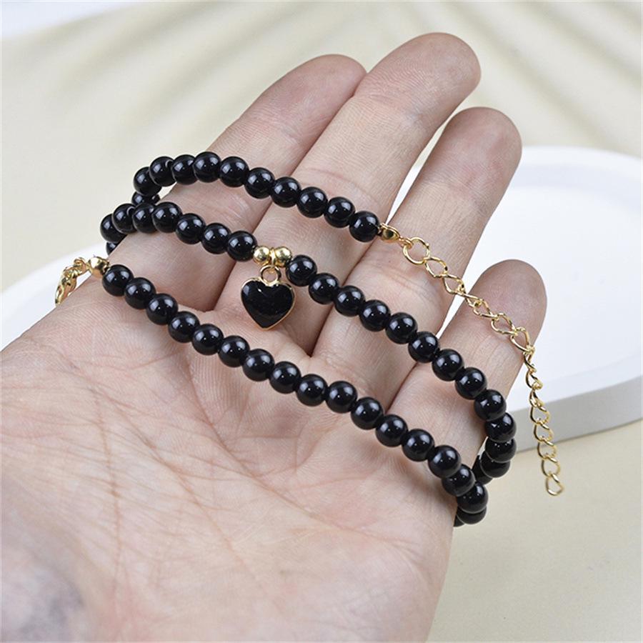 Elegant Black Pearl Necklace with Heart Pendant - Fashionable Clavicle Chain for Women