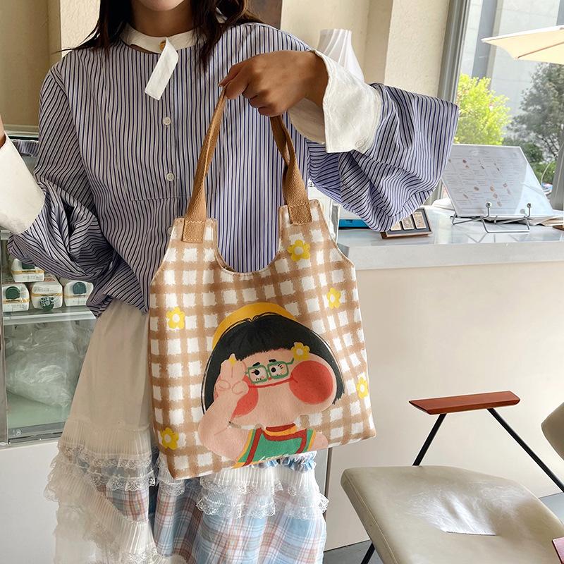 Korean version of cartoon graffiti illustration large capacity canvas bag girl funny hand-drawn comic portable shoulder bag tide
