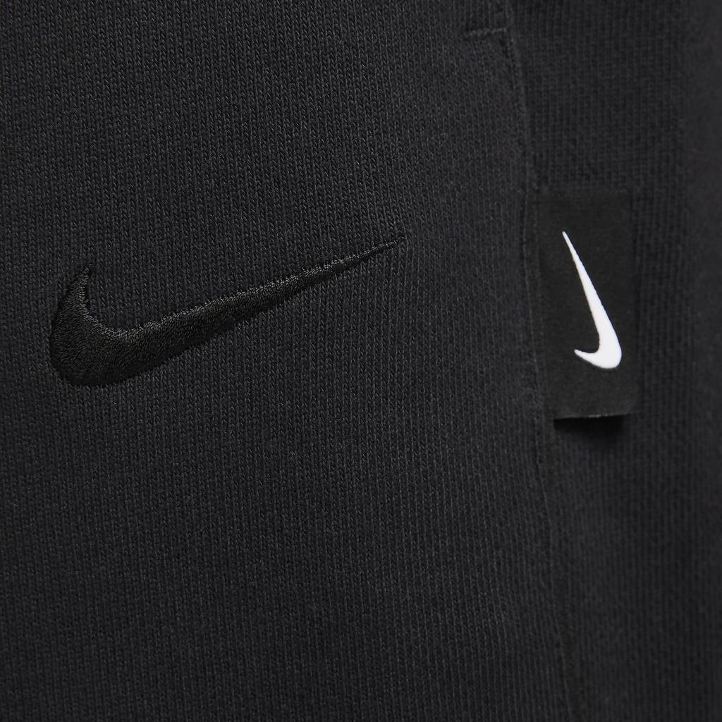 Nike Spodnie dresowe męskie dzianinowe z prostym logo i ściągaczem o luźnym kroju czarne DX0565-013