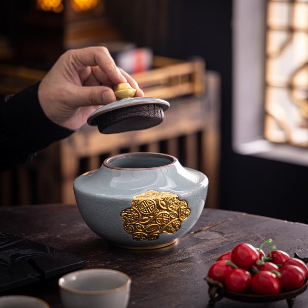 Creative Ge kiln tea jar, high-end ceramic gilded sealed storage jar, household tea storage jar