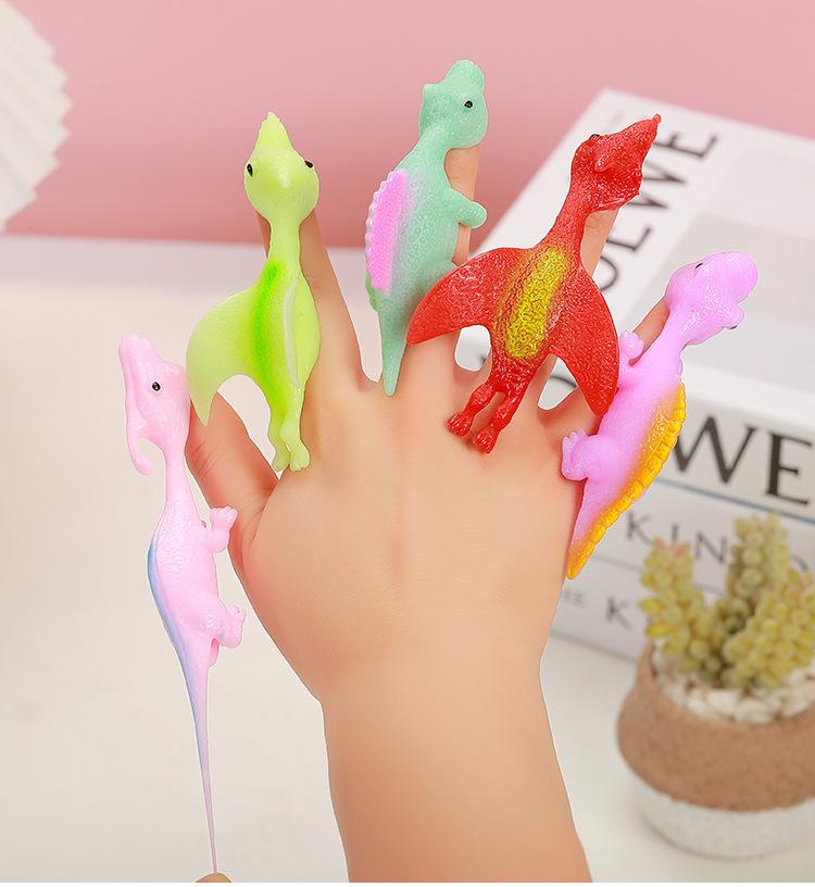 Dinosaur Finger Dart Toy: Launchable Soft Rubber Dinosaur for Stress Relief and Entertainment
