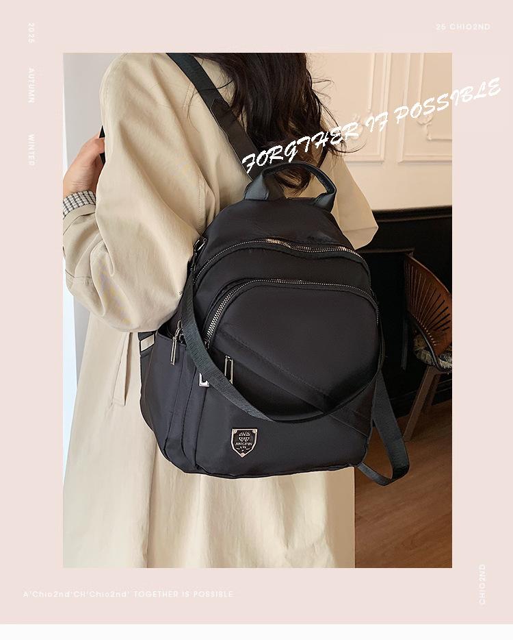 Schoolbag Simple temperament Casual backpack Multi-pocket large capacity Lightweight backpack Fashion versatile shoulder messenger bag