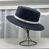 2026 Fine grass woven flat hat women's outing, British style topper women's beach vacation, versatile sun hat