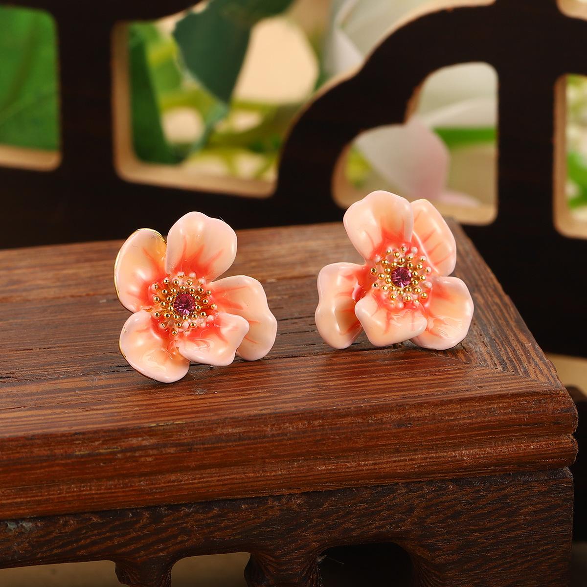 Retro flower fringed pearl earrings new three-dimensional lotus temperament enamel color drip earrings temperament women s earrings