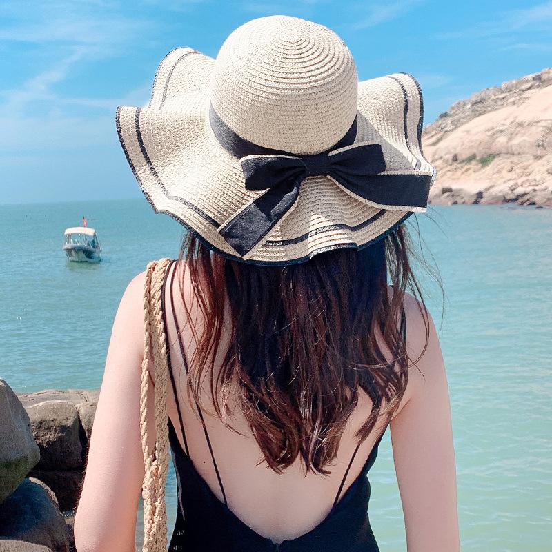 Straw hat women's small fresh and versatile pearl tether bow hat women's summer outing big eaves beach sun hat