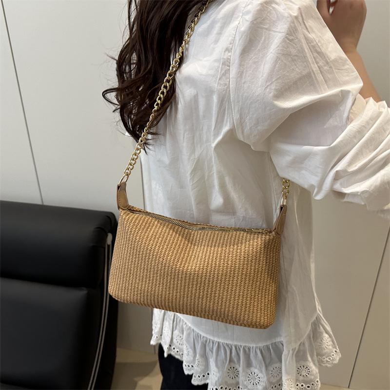2025 new holiday style straw weaving women's summer popular weaving seaside beach large capacity chain shoulder tote bag