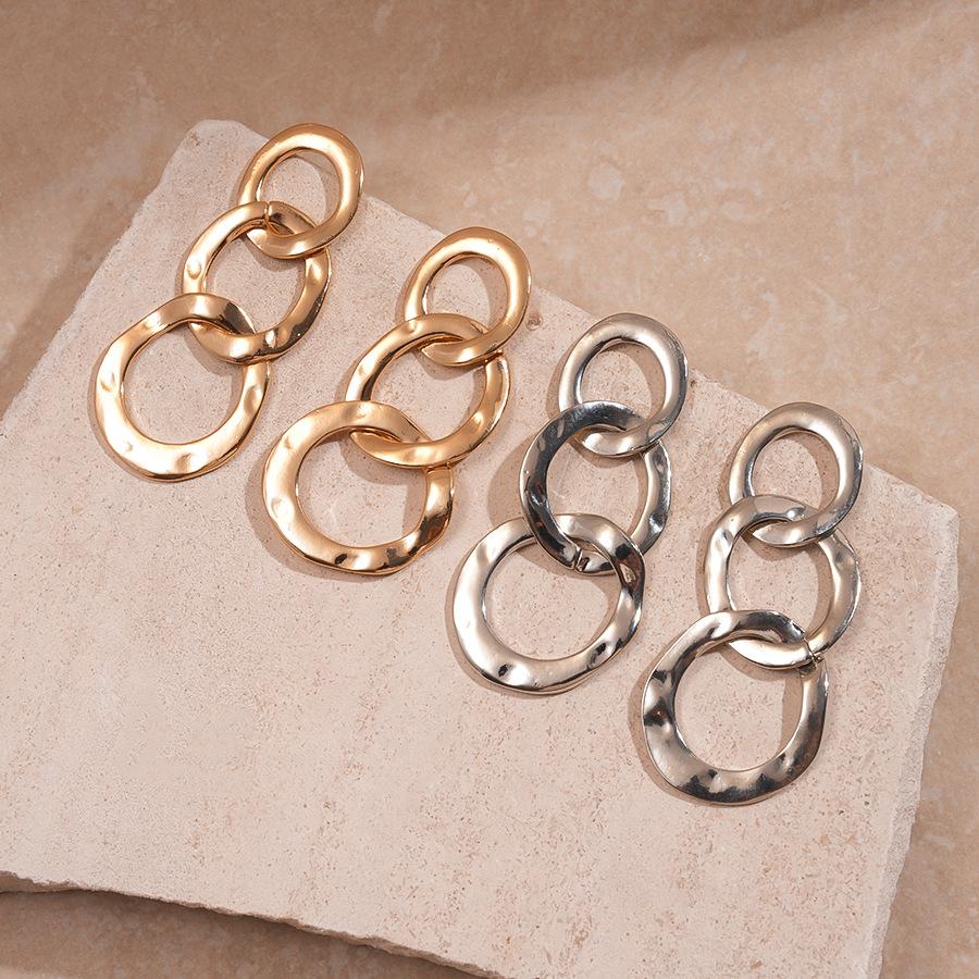 Metal pleated geometric round silver needle earrings niche cold wind earrings