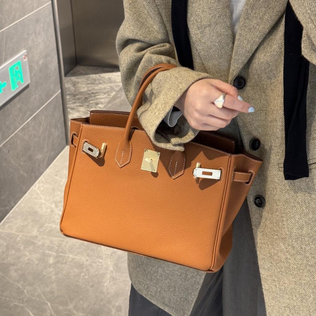 Borsa di alta qualità togo con motivo litchi color platino moda europea e americana borsa a tracolla messenger borsa a mano transfrontaliera donna