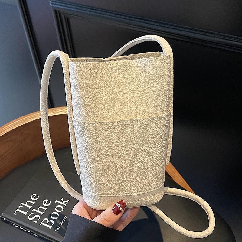 Simple niche design versatile mobile phone bag women's lychee pattern texture casual commuting solid color PU messenger bag
