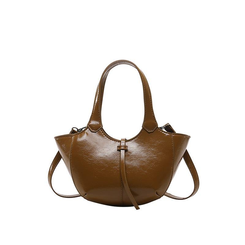 Nischenhandtasche, neue Damentasche für den frühen Frühling, hochwertige Retro-Schultertasche, einfache Pendler-Umhängetasche