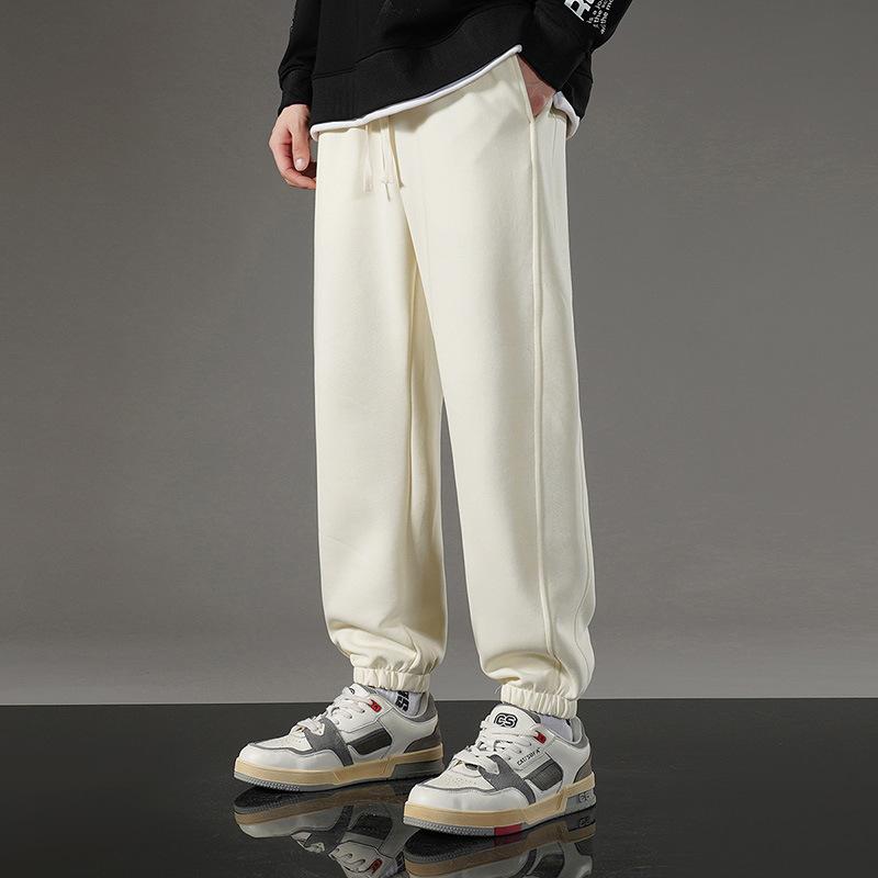 

New Men s and Women s Casual Pants Korean Version of Fashionable Versatile Temperament Elastic Sweatpants 5XL