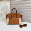 Fubao Leather Contrasting Color Splicing Eversion Retro Commuter Handbag Messenger Bag Women's Bag Single Shoulder