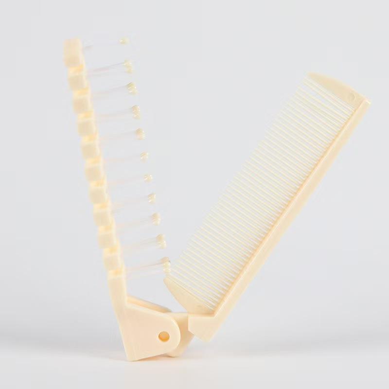 1 Stück 2 in 1 Tragbarer faltbarer Haarkamm Kopfmassage Haarkamm Antistatische Friseurwerkzeuge für Frauen Professionelles Haarstyling-Werkzeug white