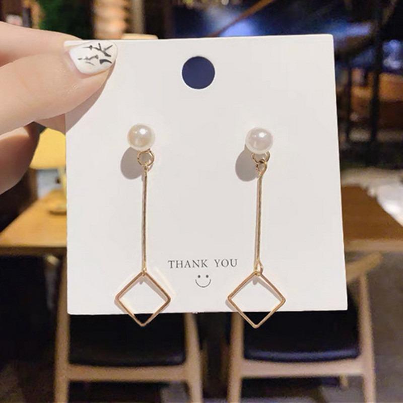 Boucles d'oreilles à longues pampilles pour femmes, style coréen Dongdaemun, design original, boucles d'oreilles polyvalentes