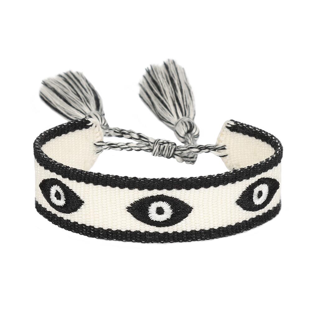 Cross-border Women s Demon Eye Woven Bracelet with Lucky Charm and Tassel Default