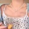 Millet beads pearl bow necklace women's niche high-end clavicle chain new temperament accessories