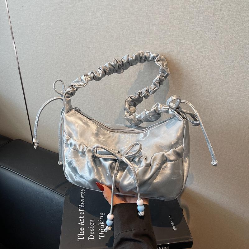Large-capacity bag women's summer new niche bow shoulder messenger bag pleated dumpling bag