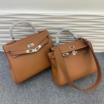 Neue Leder Kelly Tasche Swift Leder breiter Schultergurt atmosphärische Handtasche silberne Schnalle weiches Leder Mode einfache Umhängetasche