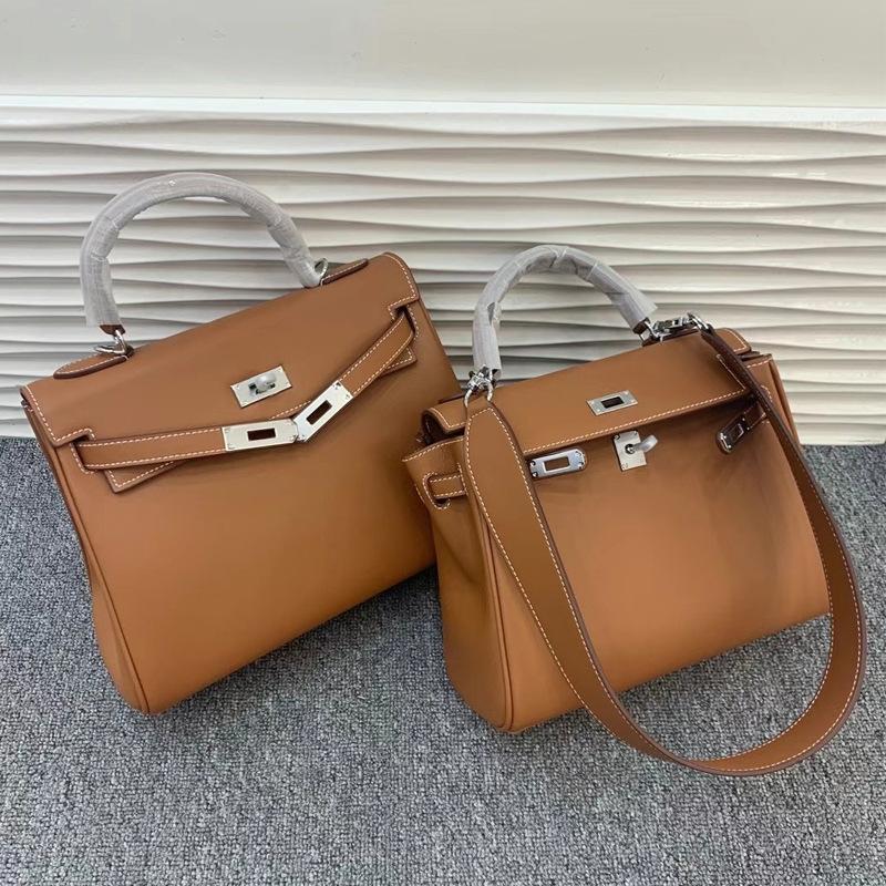 Neue Leder Kelly Tasche Swift Leder breiter Schultergurt atmosphärische Handtasche silberne Schnalle weiches Leder Mode einfache Umhängetasche