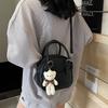 Korean Version of Fashion Popular Solid Color Women's Shoulder Bag Niche Cute Bear Pendant Shell Bag 2025 New Handbag
