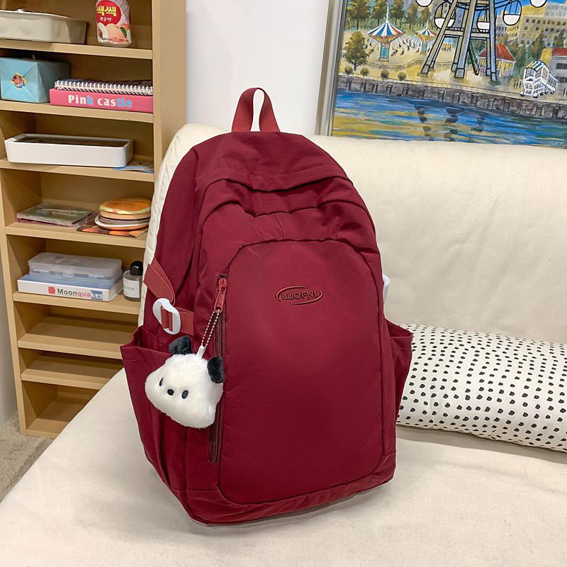 Simple Solid Color Letter Embroidery Student Backpack With Plush Pendant For Middle School Students