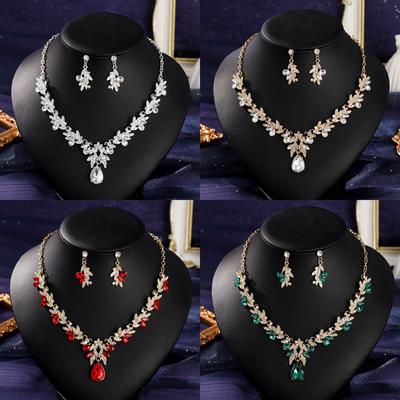 Grensoverschrijdende luxe diamant-ingelegde bruiloftssieraden legering bloemblad veelzijdige set ketting feestbanket ketting oorbel set