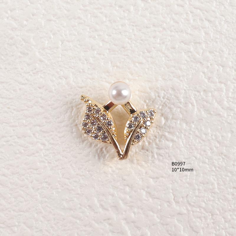 Trendiger Strass- und Zirkon-Nagelschmuck mit diamantbesetzten Metallpailletten
