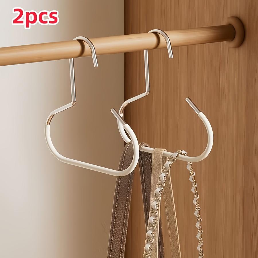 

2 simple hat storage hooks, metal material is used for scarf finishing, belt finishing, bra storage, and bag storage. 2pc white