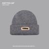 Knitted wool hat children's autumn and winter trendy brand bag head warm cold hat sticker letter big head circumference stacking hat