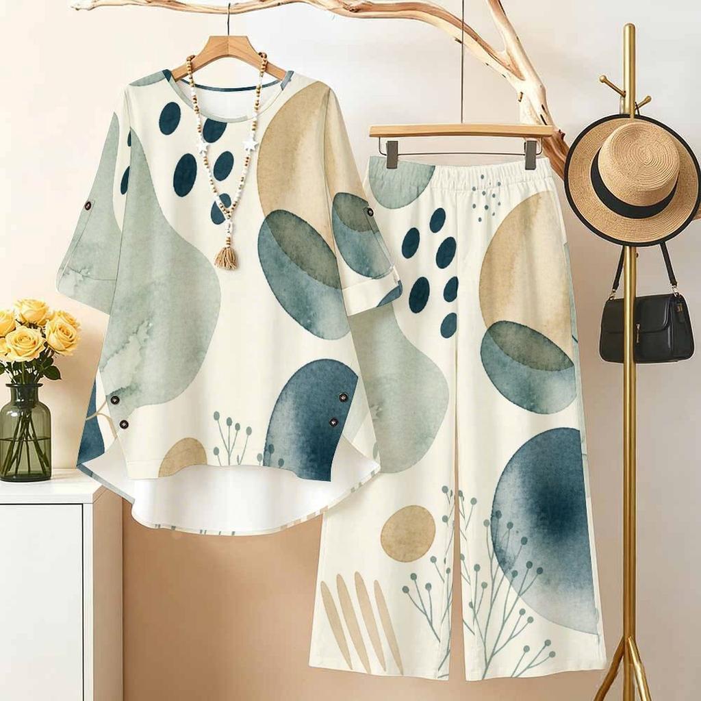 Women Plus Size Round Neck Three Quarter Sleeve Printed High Low Top And Wide Leg Pants Two Piece Set