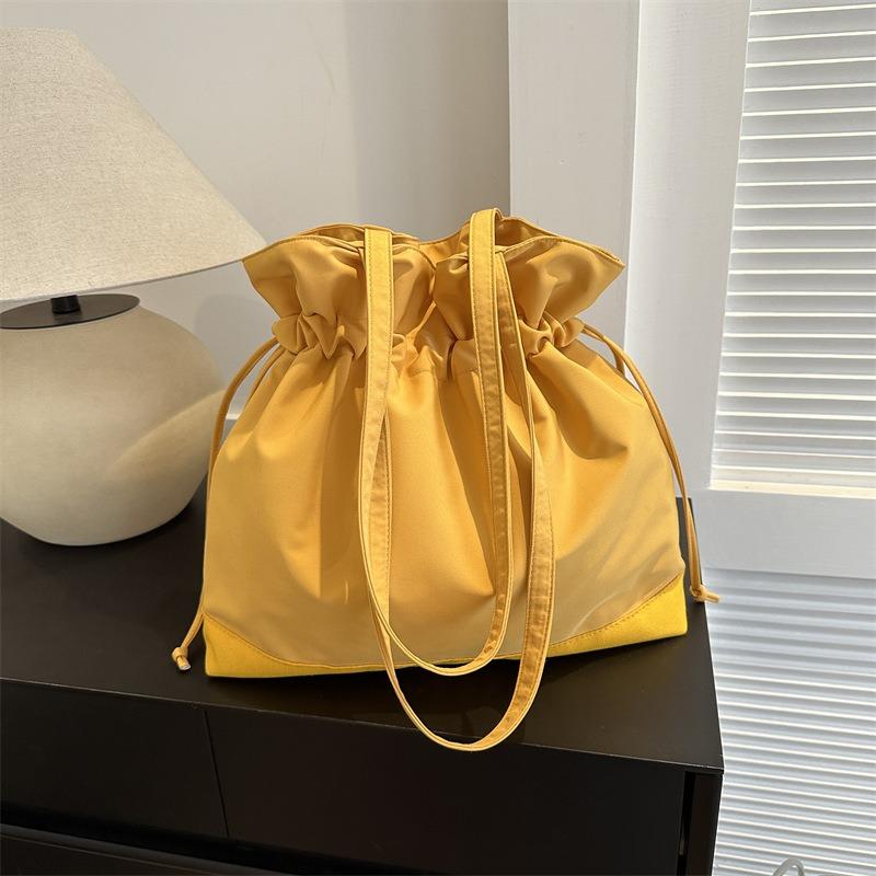 New Japanese and Korean Harajuku Oxford cloth large capacity solid color fashion casual drawstring pleated bucket shoulder bag