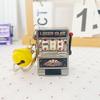 Kreativer Mini-Frucht-Spielautomaten-Schlüsselanhänger-Anhänger für Männer & Frauen