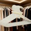Pearl Hanger: Chic Clothing Display for Fashionable Stores