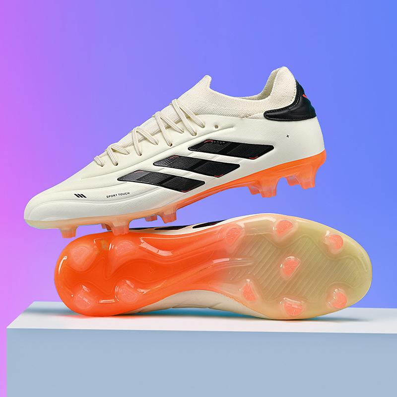 

2025 new 2025 seamless fly-woven football shoes, student men s and women s low-top spike artificial grass sports shoes 35