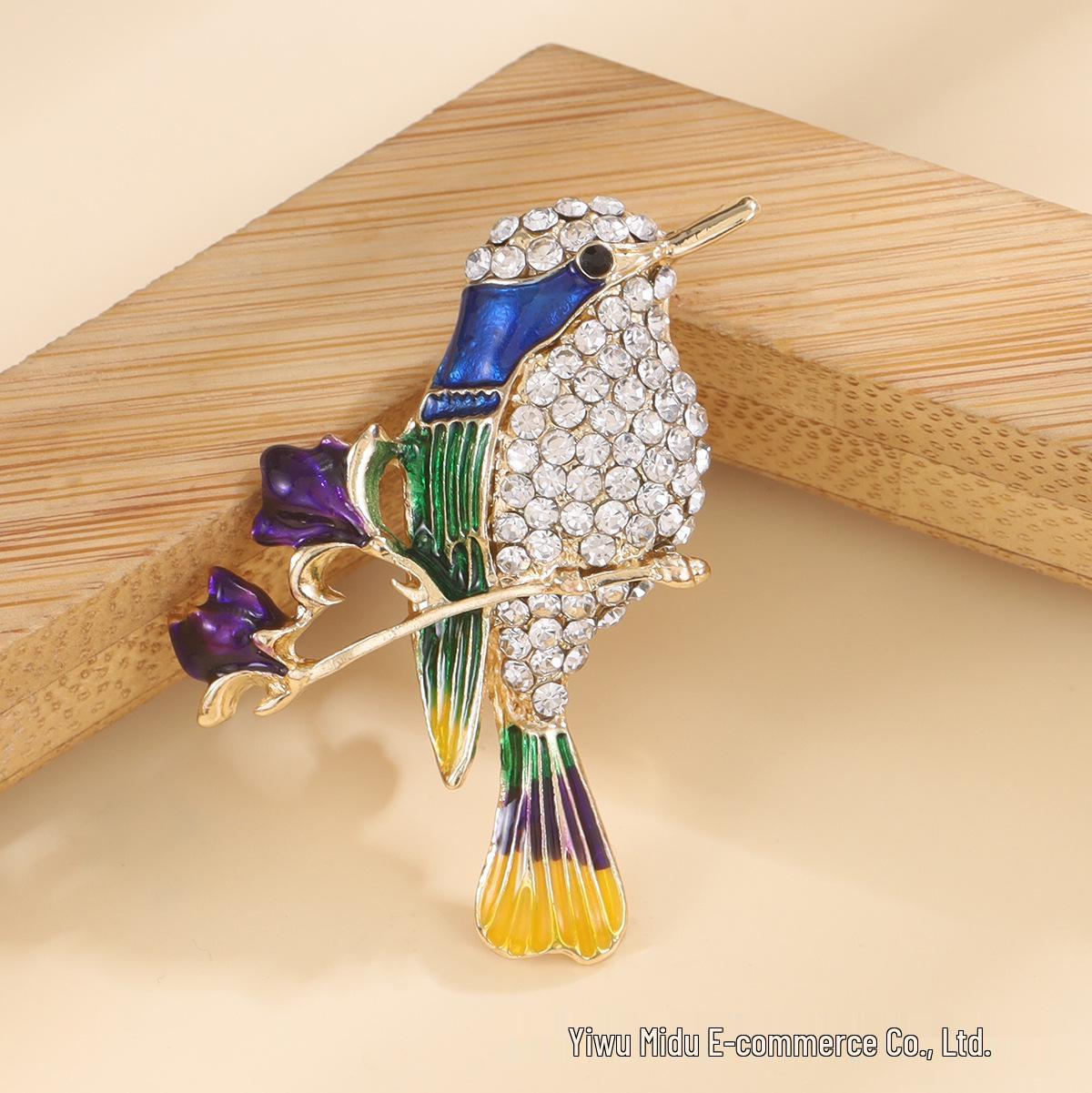 

Charming Bird and Flower Rhinestone Brooch with Enamel Detail
