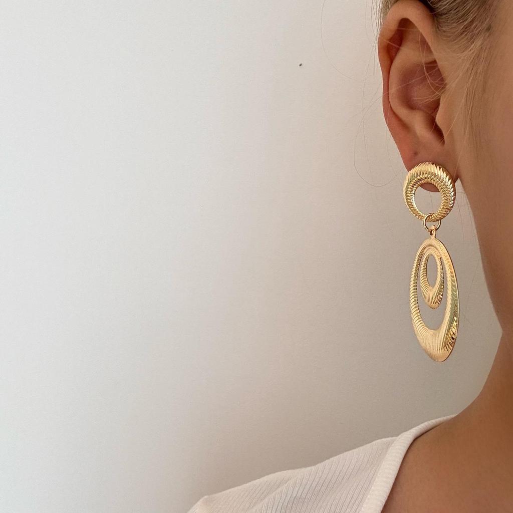 European & American Fashion Hollow Round Metal Earrings with Exaggerated Geometric Drops - INS Style for Women