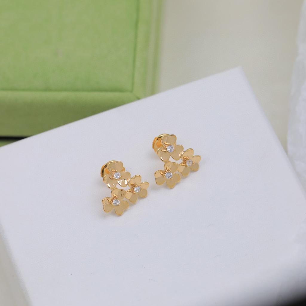Flower earrings Lucky Grass pure silver earrings+Asian gold material original logo electroplating 18K