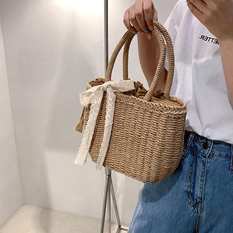 2025 Summer New Straw Bag Women's Seaside Portable Vacation Woven Bag Vegetable Basket Beach Bag Temperament Women's Bag