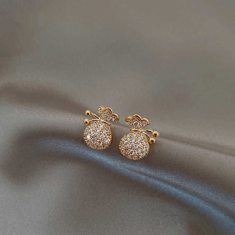 

Light luxury temperament new mini lucky bag money bag pearl earrings full of diamond stud earrings women s new models